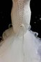 Robe de mariée robe ballonnée jusqu'au sol manche nulle avec mousseline dans l'eglise