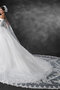 Robe de mariée a eglise chaming de traîne mi-longue avec lacets elégant