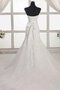 Robe de mariée en organza longueur au ras du sol avec lacets manche nulle en forme