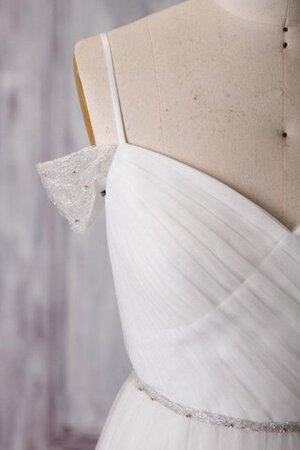 Robe de mariée naturel textile en tulle entrecroisé longueur au ras du sol fermeutre eclair