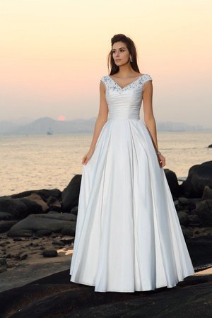 Robe de mariée longue manche nulle a plage appliques v encolure