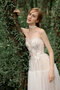 Robe de mariée textile en tulle en plage charme romantique attirent