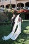 Robe de mariée de traîne courte manche nulle en forme v encolure en tulle