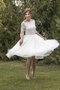 Robe de mariée nature arrivée au mollet en 1/2 manche en dentelle v col profonde