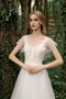 Robe de mariée en tout plein air onirique longue romantique formelle