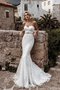 Robe de mariée romantique avec sans manches longueur au ras du sol cordon en dentelle