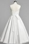 Robe de mariée vintage facile distinguee encolure ronde textile en tulle