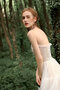 Robe de mariée textile en tulle en plage charme romantique attirent