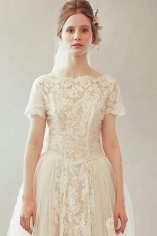 Robe de mariée fermeutre eclair ligne a encolure ronde longueur au ras du sol avec fleurs