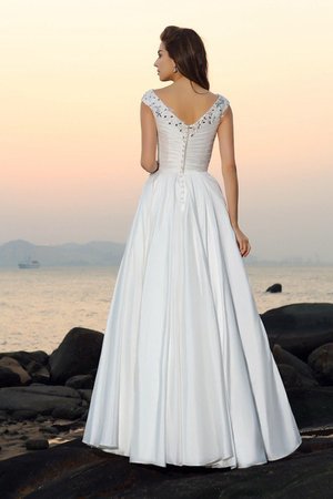 Robe de mariée longue manche nulle a plage appliques v encolure