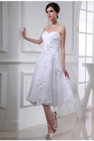 Robe de mariée fermeutre eclair avec perle en organza textile taffetas manche nulle