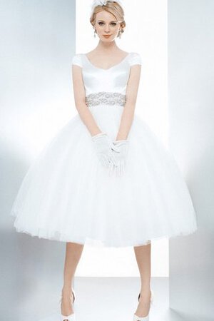 Robe de mariée nature textile en tulle boutonné avec manche épeules enveloppants avec nœud