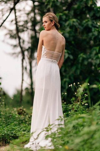 Robe de mariée manche nulle a plage col en forme de cœur longueur au ras du sol avec chiffon