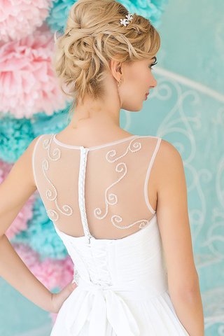 Robe de mariée nature facile a plage manche nulle avec perle