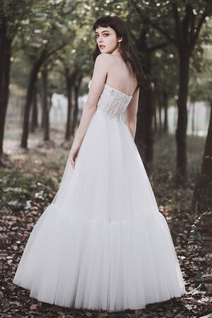 Robe de mariée cordon manche nulle avant-gardiste vintage romantique