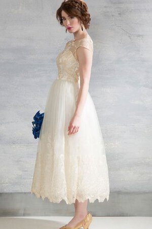 Robe de mariée nature decoration en fleur textile en tulle avec manche courte col en bateau