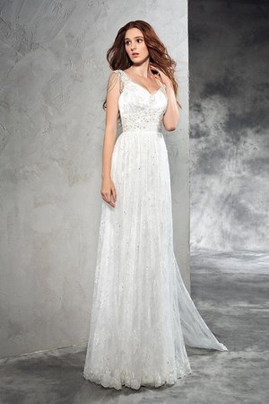 Robe de mariée longue de traîne moyenne bandouliere spaghetti ligne a manche nulle