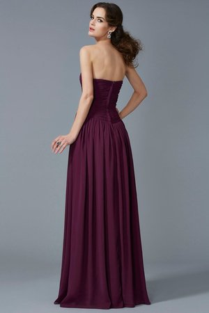 Robe de bal avec chiffon de princesse manche nulle fermeutre eclair de col en cœur