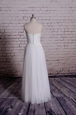 Robe de mariée plissage manche nulle fermeutre eclair en tulle ligne a