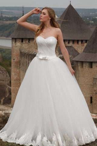 Robe de mariée a-ligne avec nœud de traîne courte en tulle manche nulle