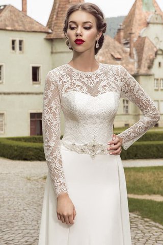 Robe de mariée romantique avec manche longue avec lacets de fourreau avec cristal