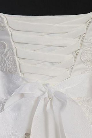 Robe de mariée en organza longueur au ras du sol avec lacets manche nulle en forme