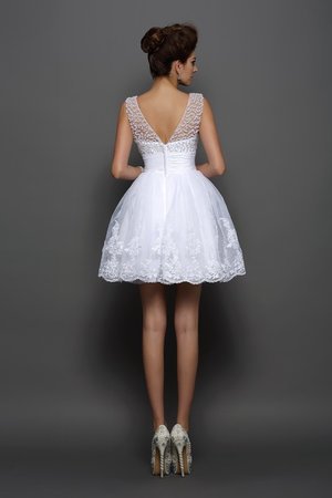 Robe de cocktail bref de princesse avec perles fermeutre eclair manche nulle