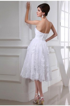 Robe de mariée fermeutre eclair avec perle en organza textile taffetas manche nulle